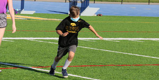jumpstart kid kicking soccer