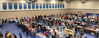 Many vender stalls and customers at Market at the Mount 
