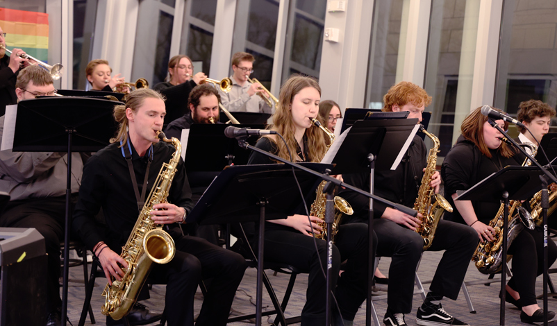 a jazz band members playing in uc Commons