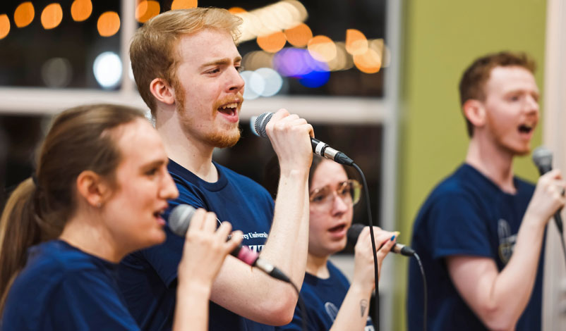 the Mount Mercy jazz choir singing at an event