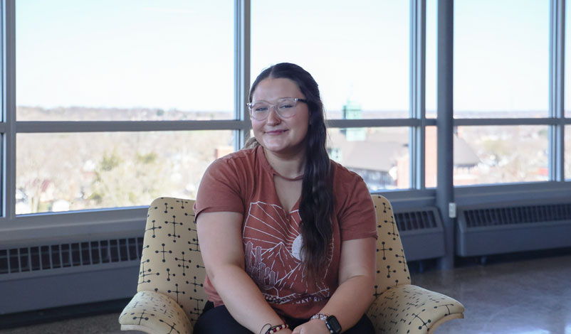 kelsey kreuder sitting in a chair at mmu penthouse