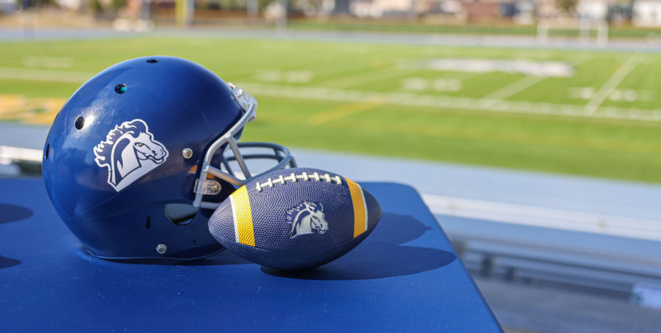 pac football helmet mustang logo